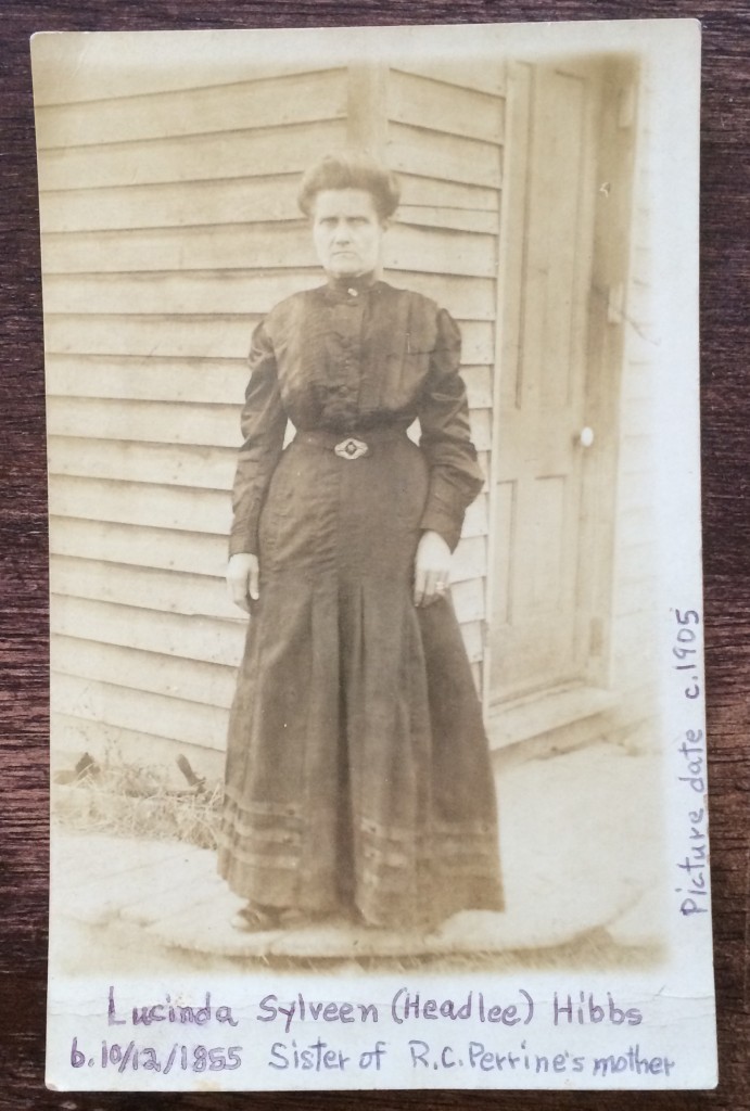 My Grandfather's Aunt Lucinda c. 1905. Appears to be standing at the corner of the store building.