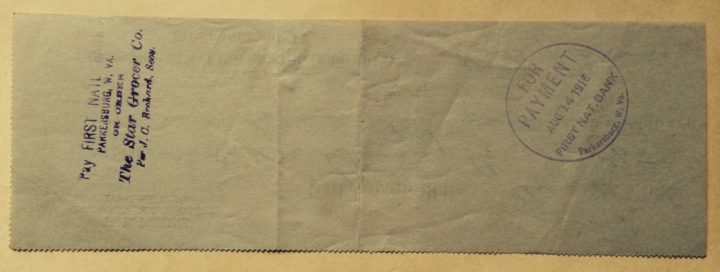 Back of check showing bank stamps.